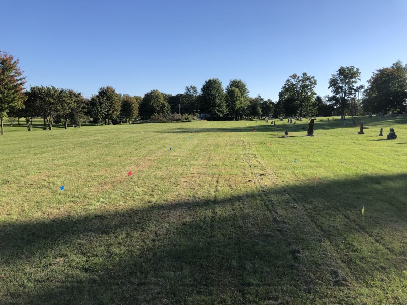 Evergreen Cemetery Section M after radar scanning on October 18, 2021. Flags indicate unmarked graves. 